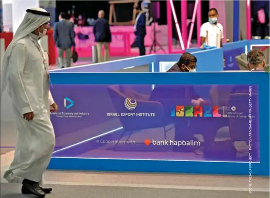  ??  ?? A visitor sits in the Israeli stand at the Gitex 2020 summit on December 8, 2020