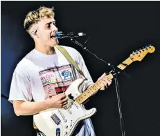  ??  ?? Uplifting: Sam Fender on stage at the Virgin Money Unity Arena, a pop-up venue in Gosforth Park, Newcastle, where 2,500 watched in social-distancing fashion