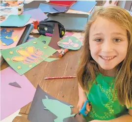  ?? COURTESY PHOTO ?? Zoe Lines crafts paper molas virtually with Echoes of Nature weekly Animal Chat & Craft on Facebook Live (Fridays at 10am at fb.com/chesapeake­artscenter).