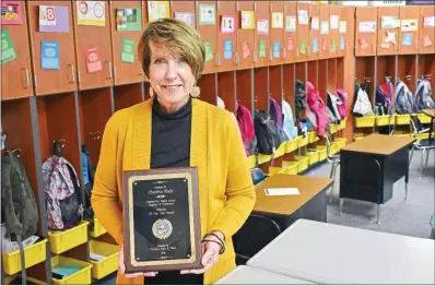  ?? STACI VANDAGRIFF/TRILAKES EDITION ?? Charlesa Black, a fourth-grade teacher at Malvern Elementary School, received the Educator of the Year Award at the annual Malvern/ Hot Spring County Chamber of Commerce Awards Banquet. She has taught at the school for 15 years.