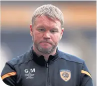  ??  ?? Hull manager Grant Mccann looks dejected
