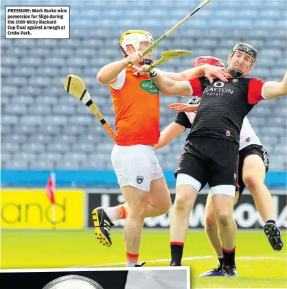  ??  ?? PRESSURE: Mark Burke wins possession for Sligo during the 2019 Nicky Rackard
Cup final against Armagh at Croke Park.