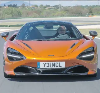  ?? McLAREN ?? David Booth got behind the wheel of the 2018 McLaren 720S, which starts at $312,500.