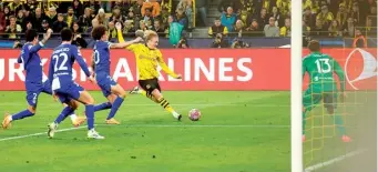  ?? AFP ?? we go: Brandt kickstarts Dortmund’s comeback after the first-leg with this strike.