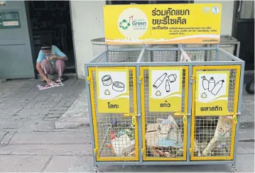  ?? PHOTOS BY SOMCHAI POOMLARD ?? Separation is an important part of successful waste management in Wat Klang Community.