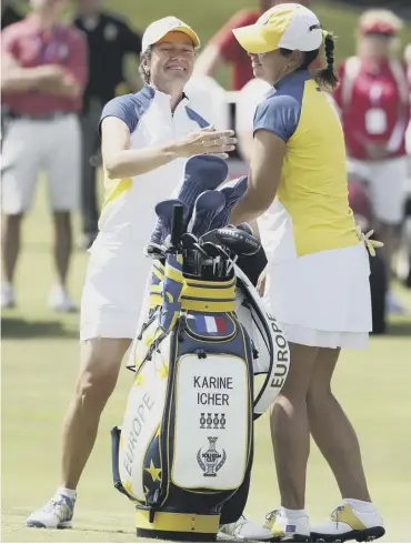  ??  ?? Catriona Matthew and Karine Icher celebrate after their last-hole foursomes win in Des Moines.