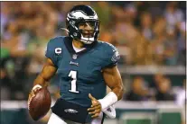  ?? THE ASSOCIATED PRESS FILE ?? Eagles quarterbac­k Jalen Hurts is confident that little by little, he’s getting better and better.