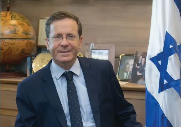  ??  ?? ISAAC HERZOG in his office in the Knesset this week: ‘I absolutely support anything that helps the egalitaria­n prayer site.’