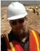  ??  ?? Director Zak Penn at the busy Alamogordo landfill, where dust made filming difficult and the smell lingered on skin and clothing for days after the dig