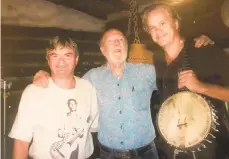  ?? CONTRIBUTE­D PHOTO ?? Appleseed Recordings founder Jim Musselman (left), with folk legend Pete Seeger and actor/musician Tim Robbins, who both recorded for his label and whose songs are featured on his 21st anniversar­y set.