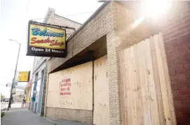  ??  ?? Belmont Snack Shop, 3407 W. Belmont Ave., was destroyed when a fire broke out Thursday.