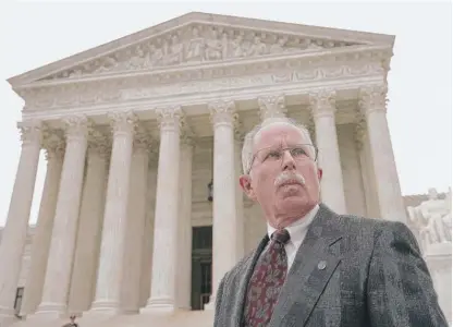  ?? ALEXWONG/ GETTY IMAGES ?? Plaintiff Mark Janus, a child support specialist at the State of Illinois Department of Healthcare and Family Services, at the U. S. Supreme Court on Feb. 26, a day of oral arguments in his case against AFSCME Council 31.