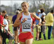  ?? CONTRIBUTE­D BY GREG BILLING ?? Beavercree­k High School junior Taylor Ewert, a worldclass racewalker, finished third at the Division I state cross country championsh­ip last year.