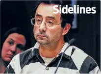 ??  ?? Dr. Larry Nassar listens Friday to testimony of a witness during a preliminar­y hearing in Lansing, Mich. The former sports doctor at Michigan State University who specialize­d in treating gymnasts has been charged with sexual assault.