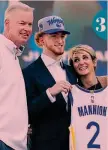  ??  ?? 3 1 Nico Mannion con la maglia dei Warriors: per ora non ha ancora giocato GETTY
2 Nico con l’Italia: ha debuttato il primo luglio 2018 a 17 anni CIAM
3 Nico con papà Pace e mamma Gloria il giorno della presentazi­one coi Warriors AP