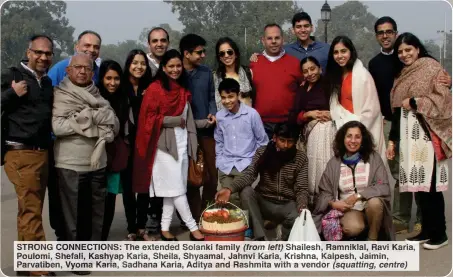  ?? ?? STRONG CONNECTION­S: The extended Solanki family (from left) Shailesh, Ramniklal, Ravi Karia, Poulomi, Shefali, Kashyap Karia, Sheila, Shyaamal, Jahnvi Karia, Krishna, Kalpesh, Jaimin, Parvatiben, Vyoma Karia, Sadhana Karia, Aditya and Rashmita with a vendor (squatting, centre)