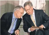  ?? SUSANWALSH, AP ?? Senate Minority Leader Harry Reid, D- Nev., left, and Senate Majority Leader MitchMcCon­nell, R- Ky., talk in the Capitol Rotunda.