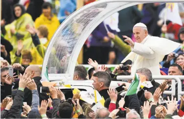  ?? Jeff J. Mitchell / Getty Images ?? Pope Francis arrives to celebrate Mass in Dublin. The priest abuse scandal dominated his visit to Ireland.