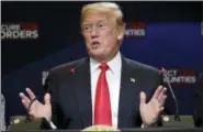  ?? EVAN VUCCI — ASSOCIATED PRESS ?? President Donald Trump speaks during a roundtable on immigratio­n policy at Morrelly Homeland Security Center in Bethpage, N.Y., on Wednesday.