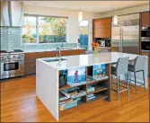  ?? MIKE SIEGEL/THE SEATTLE TIMES ?? Homeowners are increasing­ly seeking long-lasting materials; quartz countertop­s are becoming ever more popular.