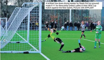  ??  ?? A brilliant low-down diving header by Steph Ord (on ground) made it 1-1 for Newcastle United Ladies in their WFA Cup match against the New Saints. Picture: IAN APPLEBY