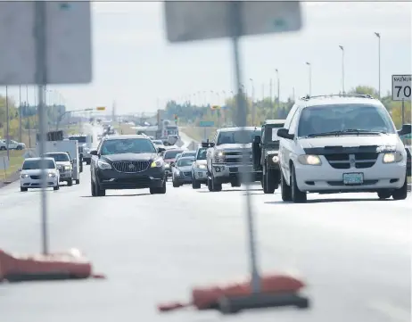  ?? MICHAEL BELL ?? Saskatchew­an Government Insurance put out a new driver’s handbook with several updates, including a section on how to use a zipper merge to keep traffic flowing as smoothly as possible when one lane is blocked by a collision, constructi­on or other...