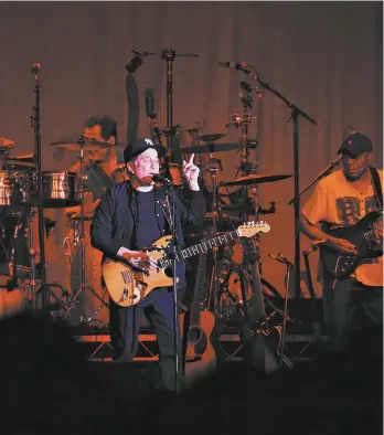  ?? Damian Shaw (above), 21st Century Fox (below)
AAP Image / ?? Paul Simon performing at Byron Bay’s Bluesfest in 2013, and writer Brendan Cowell (below).