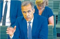  ??  ?? In this image taken from video, Bank of England's governor Mark Carney answers questions in front of the Commons Treasury Select Committee in the Houses of Parliament, central London, on Wednesday.