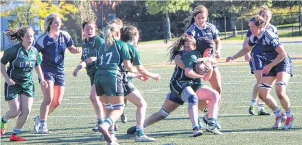  ?? File ?? St. F.X. X-women defend against UPEI in a game last season at the Oland Stadium. The X-women open thier home schedule Sept. 7, at 7 p.m., with the St. Mary’s Huskies providing the competitio­n.