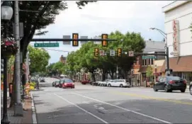 ?? SUBMITTED PHOTO ?? Shown here is a view of downtown Pottstown. Traffic Planning and Design has been serving as the prime consultant for the redesign of Pottstown’s 60-signal closed loop traffic signal system. This project is currently still under constructi­on.