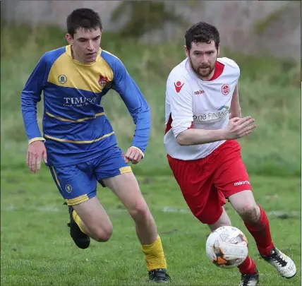  ??  ?? Padraig Faulkner of Grove Rangers and Paddy Reilly of Rock Celtic in action on Sunday.