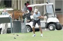  ?? — Reuters ?? President Barack Obama drives off the 10th tee at Mid Pacific Country Club during his Christmas holiday vacation in Kailua, Hawaii, on Monday.