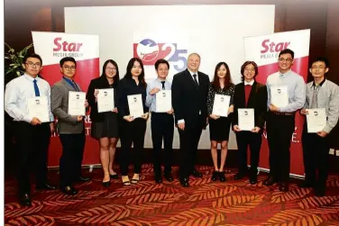  ??  ?? Prof Kendall (fifth from right) with the nine University of Nottingham Malaysia students who are this year’s recipients of Star Education Fund scholarshi­ps.