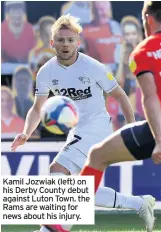  ??  ?? Kamil Jozwiak (left) on his Derby County debut against Luton Town. the Rams are waiting for news about his injury.