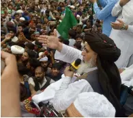  ?? AFP ?? Head of the Tehreek-e-labbaik pakistan, Khadim Hussain rizvi, addresses a rally against alleged election rigging in lahore. —