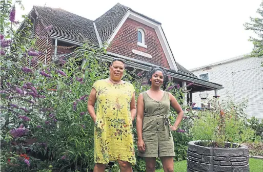  ?? DEBRA NORTON PHOTOS ?? Volunteers Elaine Genus and Amrutha Simon take care of the gardens at Maple Cottage. They say there is a need for more volunteers and support.