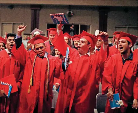  ?? [PHOTO BY SARAH PHIPPS, THE OKLAHOMAN] ?? U.S. Grant High School graduates celebrate following an English language learner ceremony May 19 in Oklahoma City.