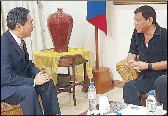  ??  ?? South Korean Ambassador Kim Jaeshin pays a courtesy call on president-elect Rodrigo Duterte in Davao City last week. Kim told Duterte he hoped to improve ties between the two countries, particular­ly against North Korea, which continues to develop...