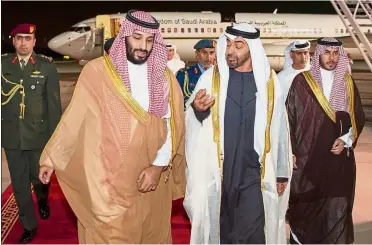  ??  ?? Eye of the storm: Crown Prince Mohammed bin Salman (left) being received by Abu Dhabi’s Crown Prince Sheikh Mohammed bin Zayed in Abu Dhabi, UAE. — Reuters