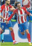  ?? FOTO: DPA ?? Hier glauben sie noch an das Wunder: Atléticos Antoine Griezmann (r.) bejubelt das 2:0.