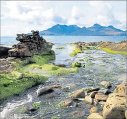  ??  ?? Isle of Rum pictured from the Isle of Eigg