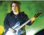  ??  ?? Unverkennb­ar: Robert Smith mit The Cure