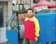  ?? PROVIDED TO CHINA DAILY ?? Liu Zhigang stands in front of his motor tricycle in Harbin, Heilongjia­ng province.