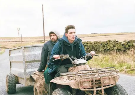  ?? Agatha A. Nitecka Orion Pictures / Samuel Goldwyn ?? JOSH O’CONNOR, right, stars as a Yorkshire farm lad who is drawn to a Romanian migrant worker portrayed by Alec Secareanu.