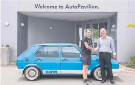  ??  ?? WELCOME. Jamie Orr in front of the VW Auto Pavilion entrance in PE.