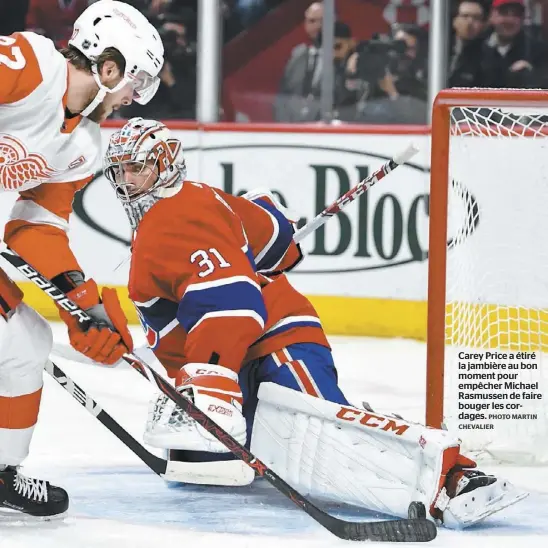  ?? PHOTO MARTIN CHEVALIER ?? Carey Price a étiré la jambière au bon moment pour empêcher Michael Rasmussen de faire bouger les cordages.