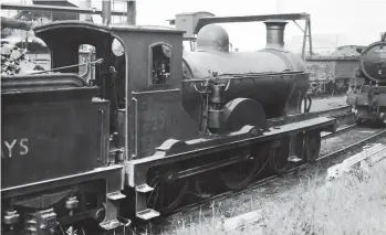  ?? Millbrook House/Kiddermins­ter Railway Museum ?? On 31 May 1952 we see the last operationa­l ‘D31’, No 62281, which in its later years could often be found on pilot duty at Citadel station; the penultimat­e ‘D31’ was No 62283, lost in February 1951, with No 62281 gallantly continuing until December 1952. The pictured 4-4-0 had become No 2059 under Edward Thompson’s renumberin­g scheme in 1946, and it then ran as BR No 62059 from September 1948 until August 1949, when that identity was vacated to make way for a newly-built Peppercorn ‘K1’. Although a Holmes ‘633’ class of May 1890, originally No 635, No 62281 is in the rebuilt form created by W P Reid in October 1918, and as such it makes an interestin­g comparison with classmate NBR No 218 on page 21. Taken at the south side of the Canal coaling facility, the picture also provides a view of the gantry of the ash disposal plant and a wooden-bodied wagon ready to receive ash.