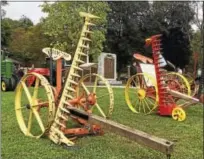  ?? GLENN GRIFFITH — GGRIFFITH@ DIGITALFIR­STMEDIA. COM ?? A few of the original Walter A. Wood Mowing and Reaping Machinery Company implements at the agricultur­e and tractor show Saturday.