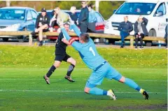 ?? Photo / File ?? Calvert is known for his skills on the field as a goalkeeper, seen here in 2018 blocking a shot at goal from Whanganui City striker Daniel Aplin.
