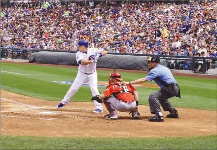  ?? Photo by Steve MacNaull ?? Chicago Cubs’ Miguel Montero waits for a pitch in the Cubs vs. Cincinnati Reds game during Cactus League spring training in Mesa, Arizona.